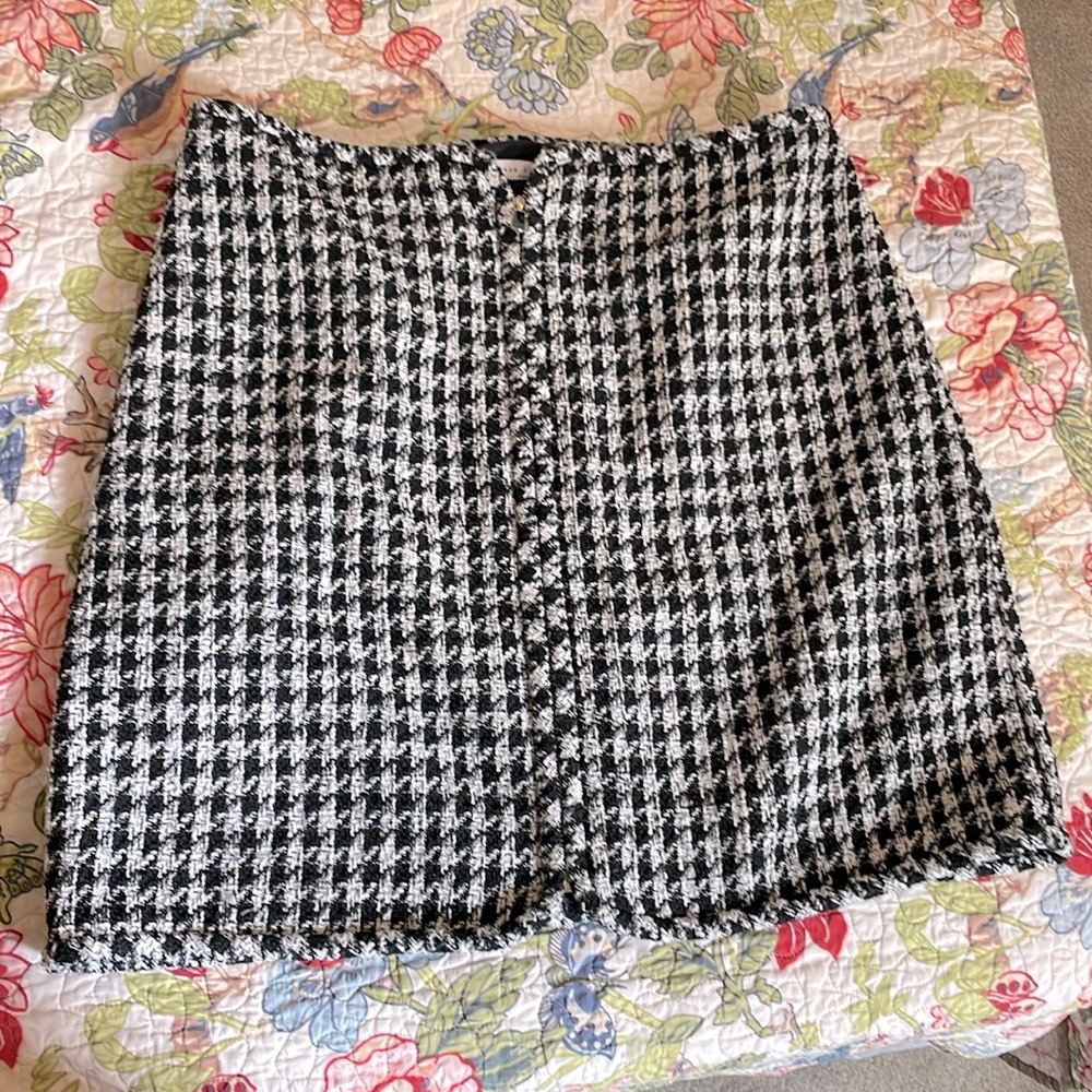 Black and white checkered skirt with gold zipper